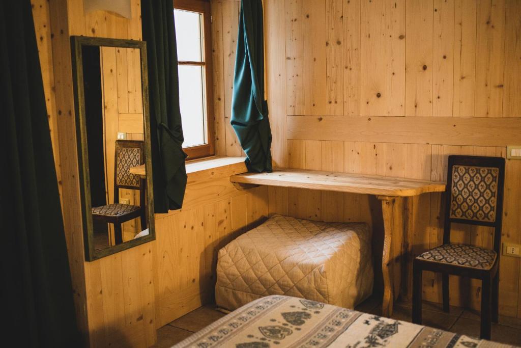 Postel nebo postele na pokoji v ubytování Residence Les Fleurs