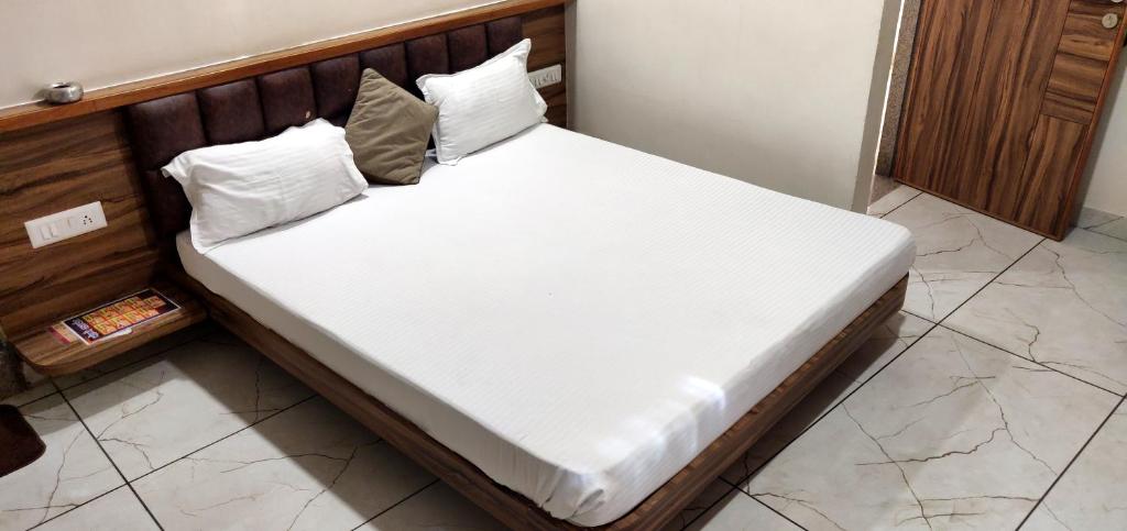 Postel nebo postele na pokoji v ubytování Hotel Milan