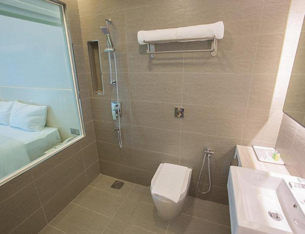 Koupelna v ubytování Minimalist Hotel