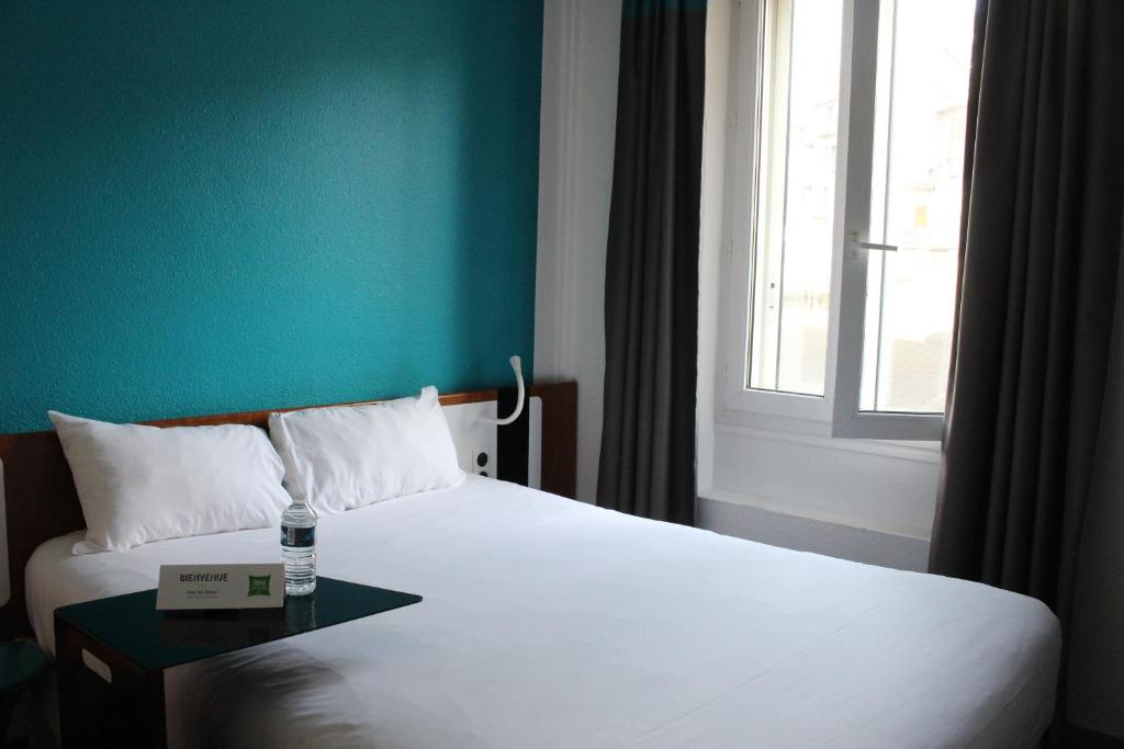 Postel nebo postele na pokoji v ubytování Ibis Styles Chambery Centre Gare