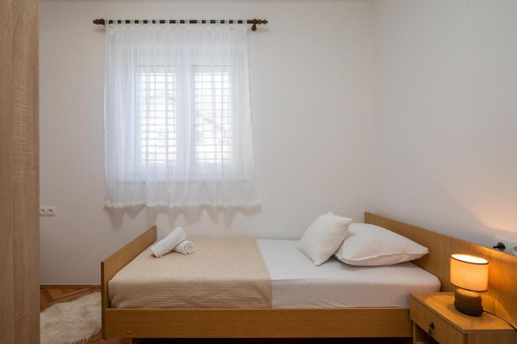Posteľ alebo postele v izbe v ubytovaní Beach Apartments Croatia
