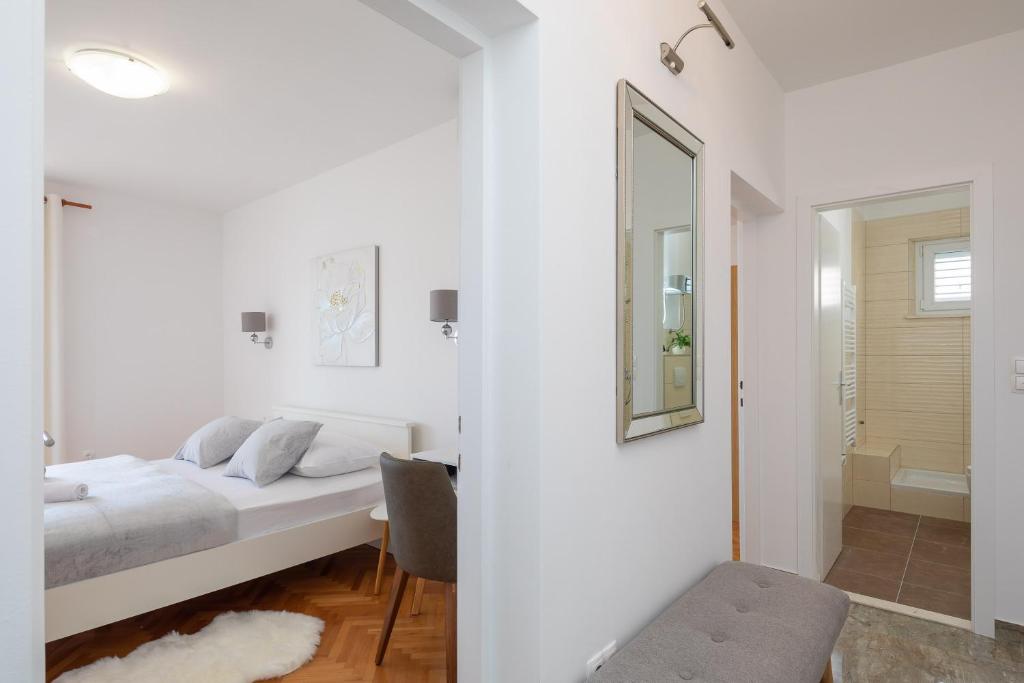 Posteľ alebo postele v izbe v ubytovaní Beach Apartments Croatia