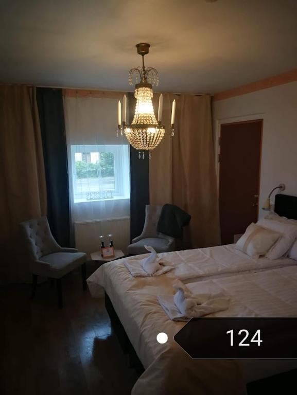 Postel nebo postele na pokoji v ubytování Hotell Wettern