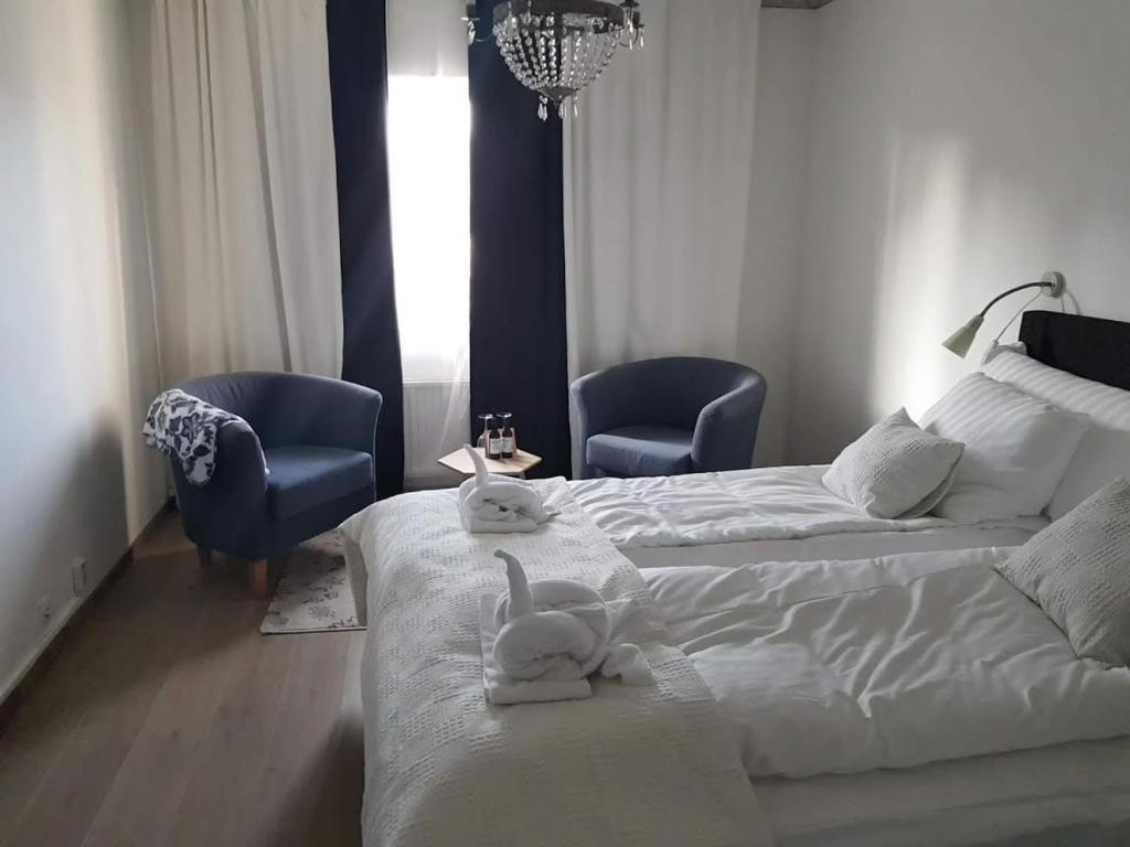 Postel nebo postele na pokoji v ubytování Hotell Wettern