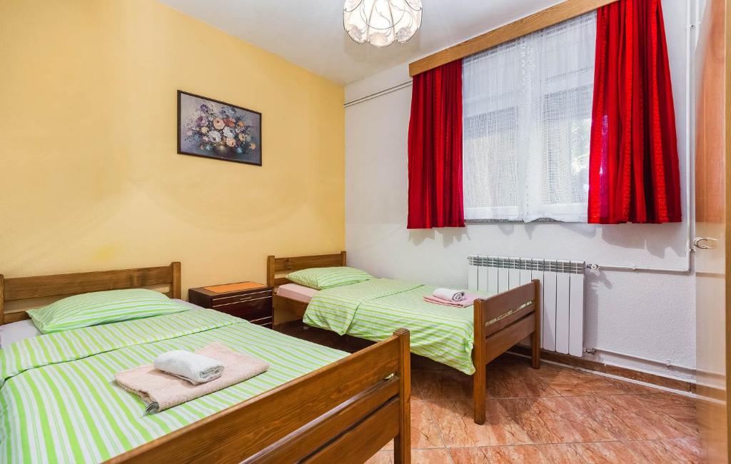 Posteľ alebo postele v izbe v ubytovaní Jure