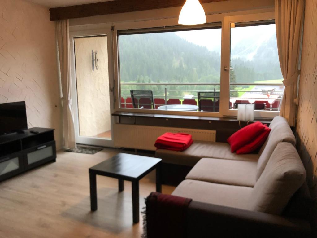 Posedenie v ubytovaní Groot appartement in Aparthotel met prachtig uitzicht