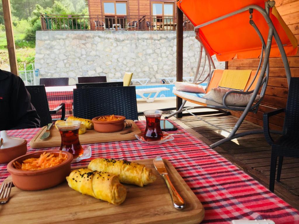 a table with a tray of food on a table at 7 Green Adrasan in Adrasan