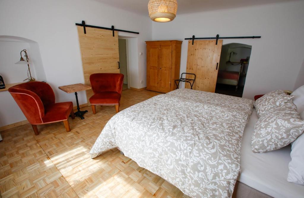 Postel nebo postele na pokoji v ubytování Weingut Langmayer