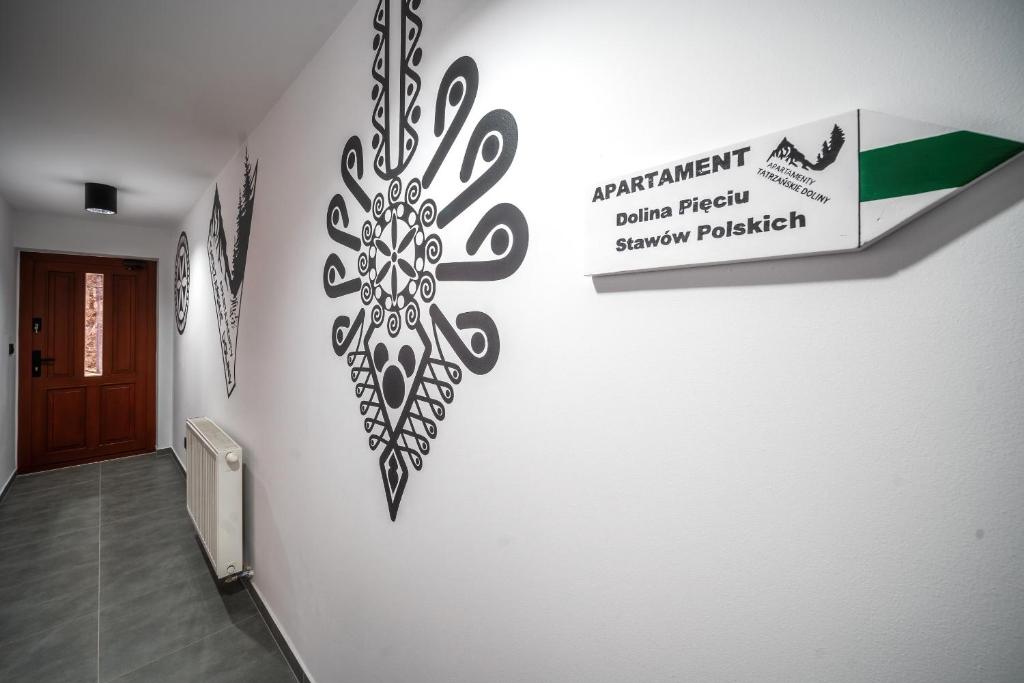 Certifikát, ocenenie alebo iný dokument vystavený v ubytovaní Apartamenty Tatrzańskie Doliny