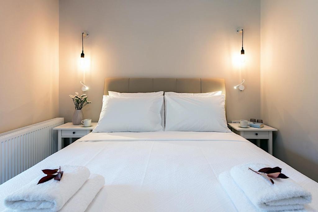Postel nebo postele na pokoji v ubytování Maritasa House
