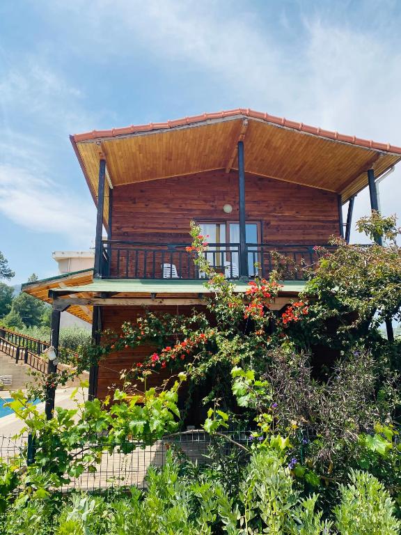 a wooden house with a roof at 7 Green Adrasan in Adrasan