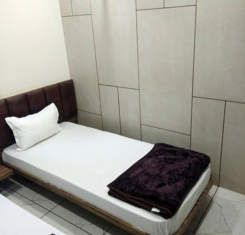 Postel nebo postele na pokoji v ubytování Hotel Milan