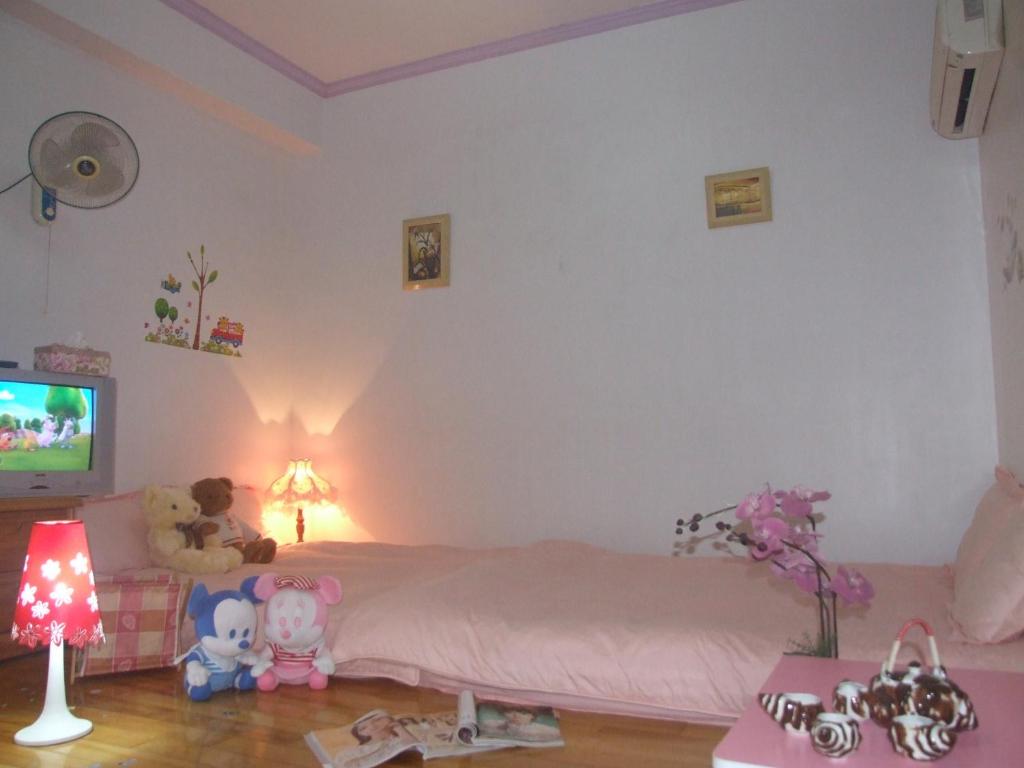 TV a/nebo společenská místnost v ubytování Yilan Xiang Feng Homestay