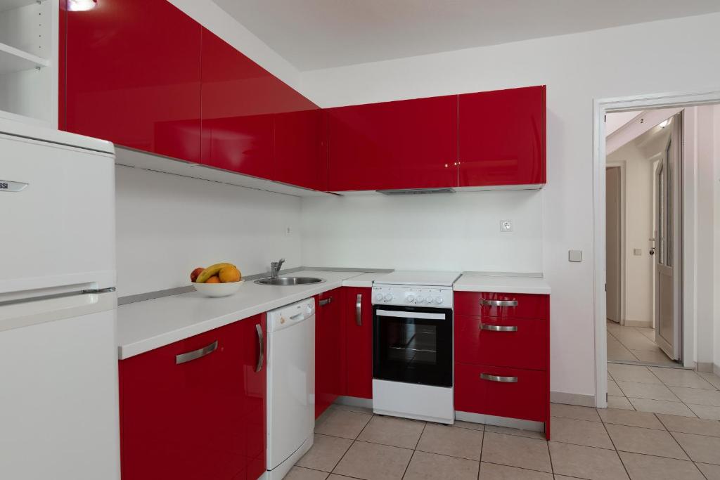 Kuchyň nebo kuchyňský kout v ubytování Apartment Kathy