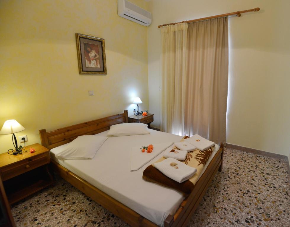 Posteľ alebo postele v izbe v ubytovaní Zambia Apartments