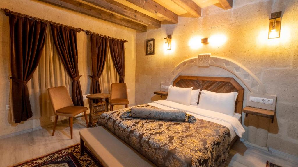 Postel nebo postele na pokoji v ubytování In Stone House