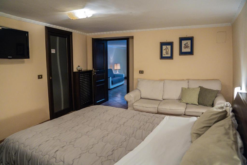 A bed or beds in a room at Domus Ugo