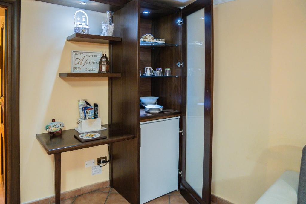A kitchen or kitchenette at Domus Ugo