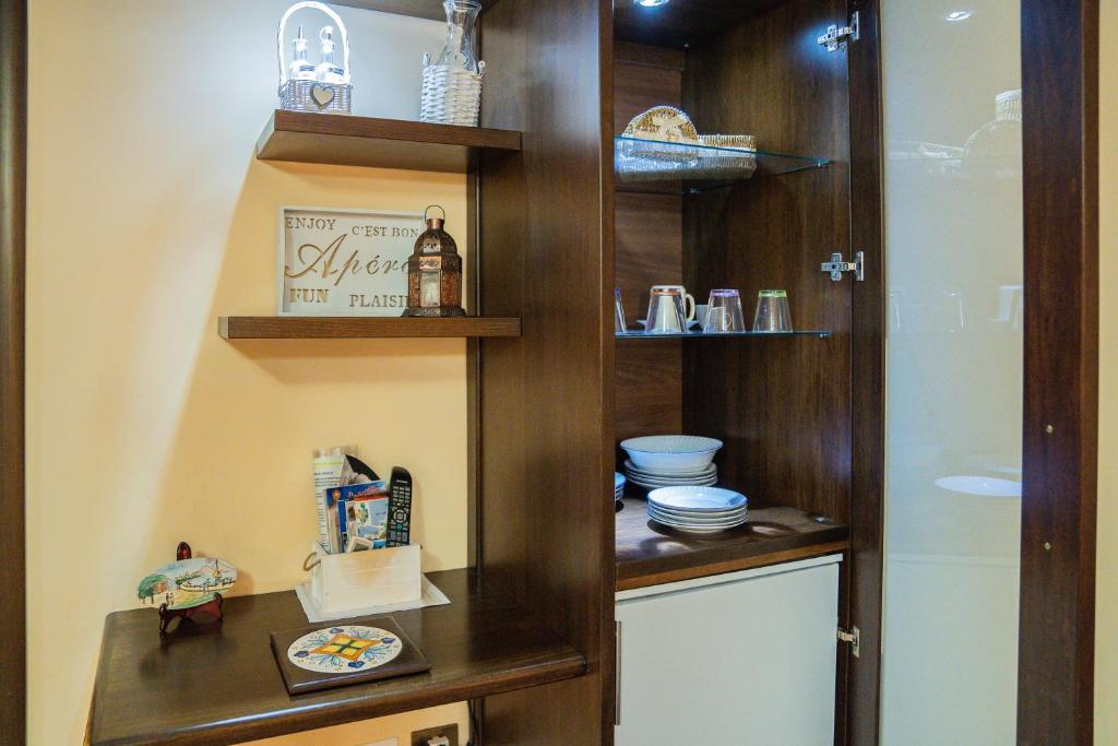 A kitchen or kitchenette at Domus Ugo
