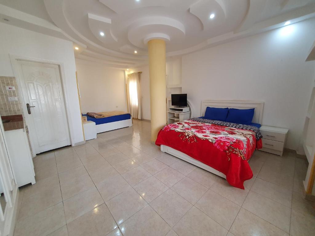 Postel nebo postele na pokoji v ubytování Spring Hotel Luxor