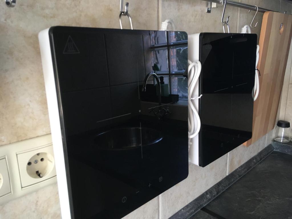 Kuchyňa alebo kuchynka v ubytovaní Balatonlelle Apartmanház