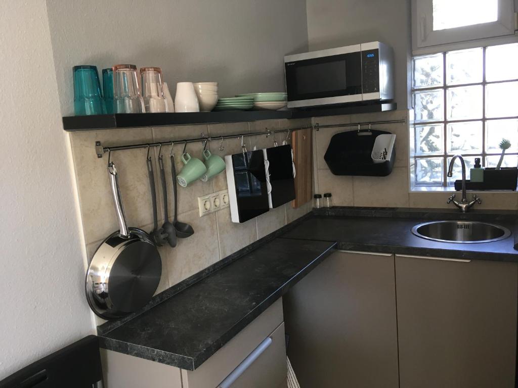 Kuchyňa alebo kuchynka v ubytovaní Balatonlelle Apartmanház