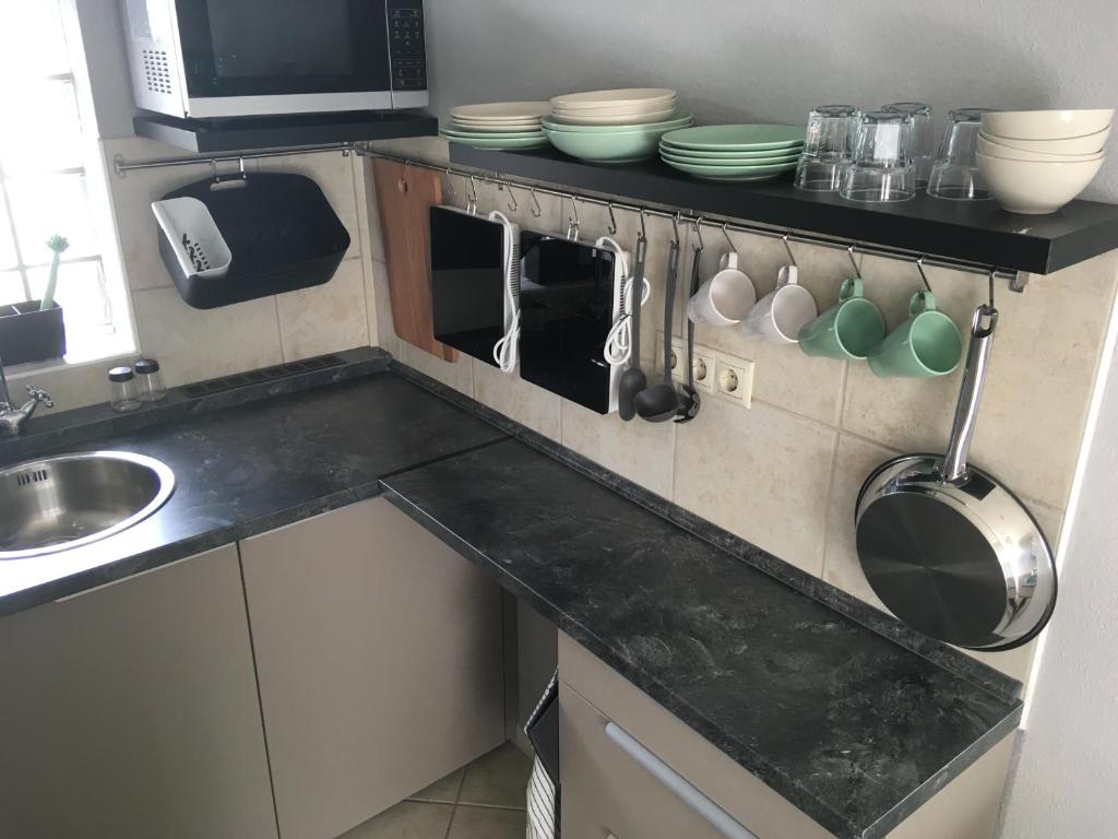 Kuchyňa alebo kuchynka v ubytovaní Balatonlelle Apartmanház