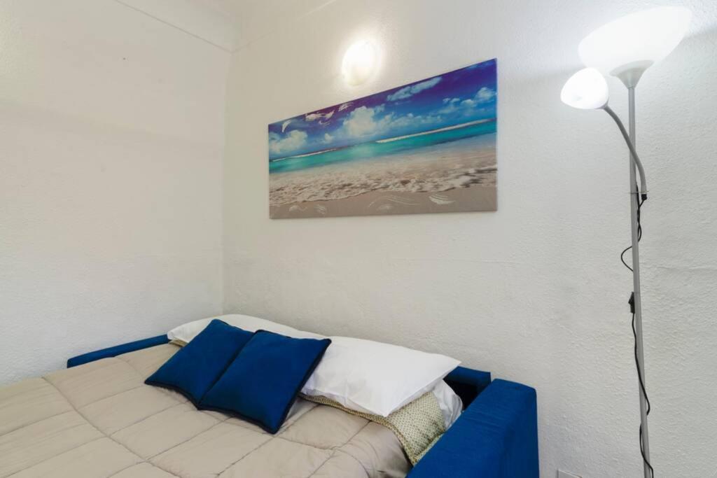 Posteľ alebo postele v izbe v ubytovaní San Siro Suite SS1 Sanremo centro a due passi dal mare