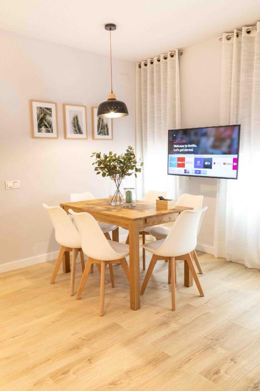 Televízia a/alebo spoločenská miestnosť v ubytovaní Barcelona Touch Apartments - Campalans