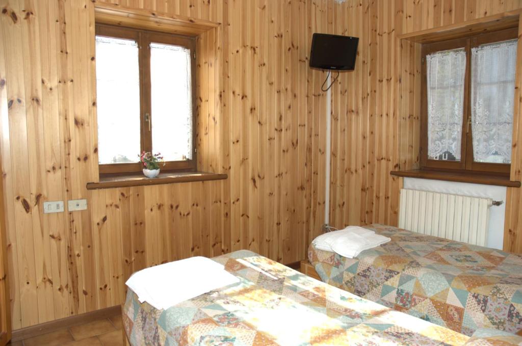 Postel nebo postele na pokoji v ubytování Casa Vacanze Ca' De Val