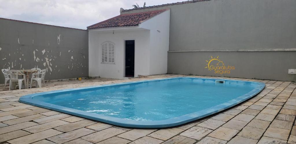  Casa de Veraneio com Piscina Guaratuba