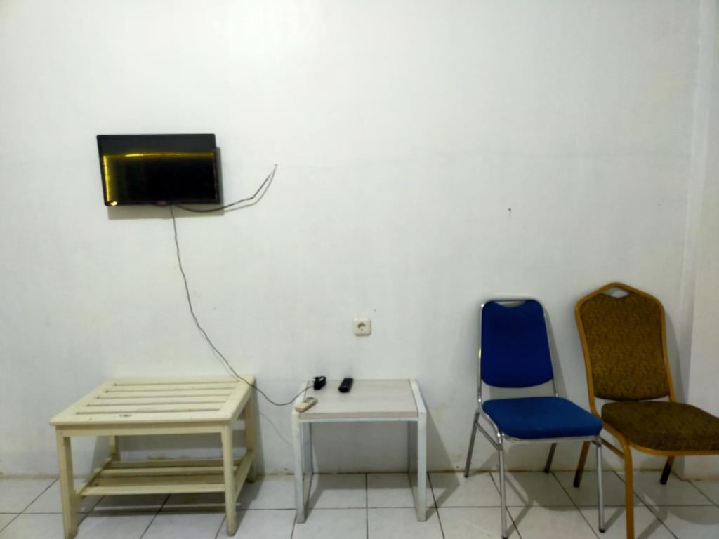 TV a/nebo společenská místnost v ubytování Hotel Nirwana Ternate RedPartner