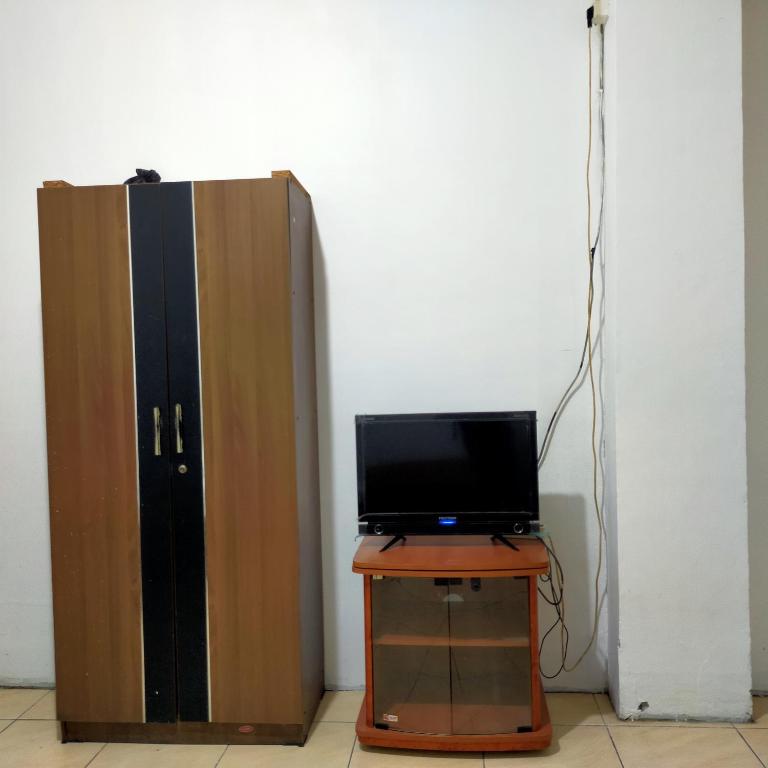 TV a/nebo společenská místnost v ubytování Hotel Nirwana Ternate RedPartner