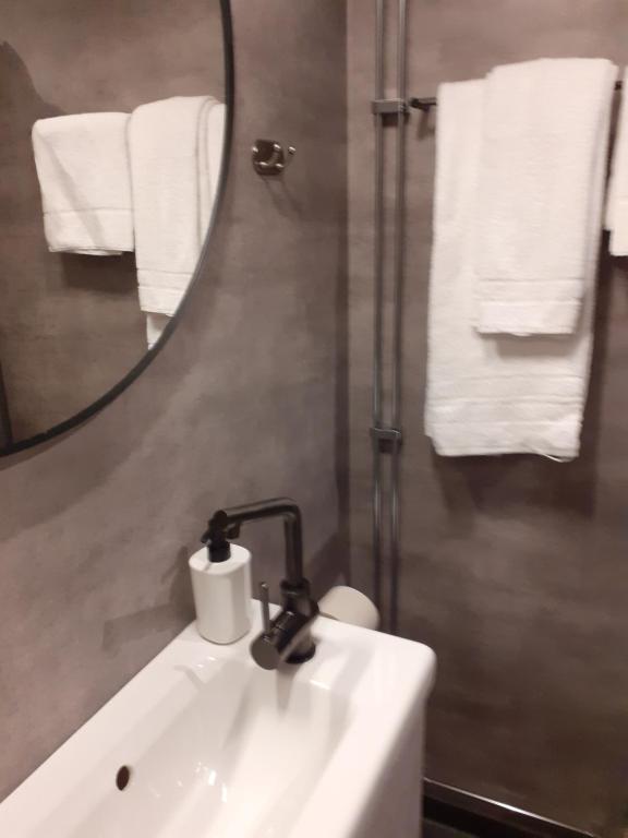 Koupelna v ubytování Hotell Greven