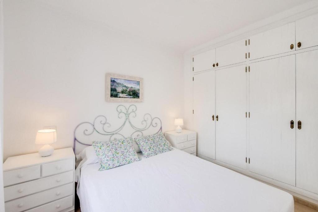 Postel nebo postele na pokoji v ubytování Apartamento Puesta de Sol
