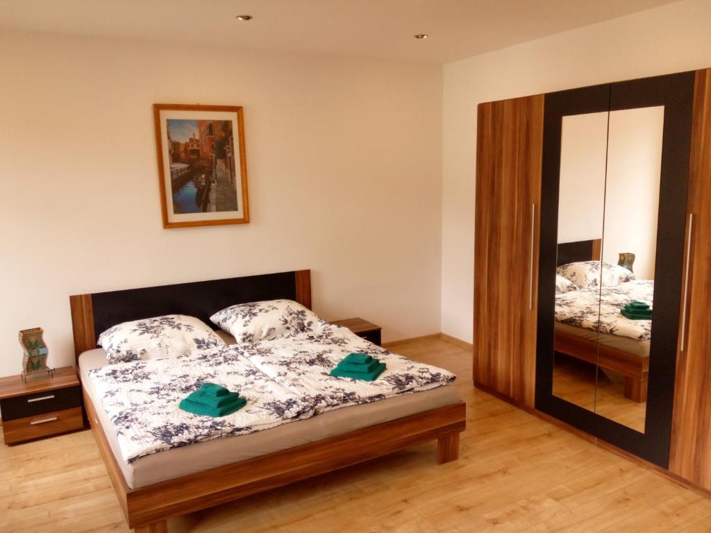 Ένα ή περισσότερα κρεβάτια σε δωμάτιο στο Apartmán Albreit 1