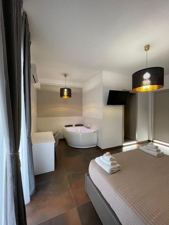 Posteľ alebo postele v izbe v ubytovaní Relais Petruzzelli