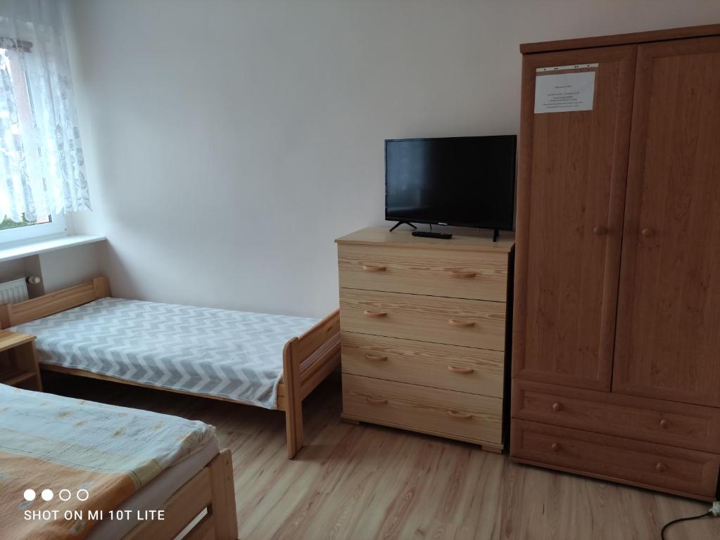 Postel nebo postele na pokoji v ubytování Villa Joanna