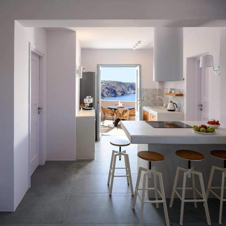 Kuchyň nebo kuchyňský kout v ubytování Ambeli Sunset Villas
