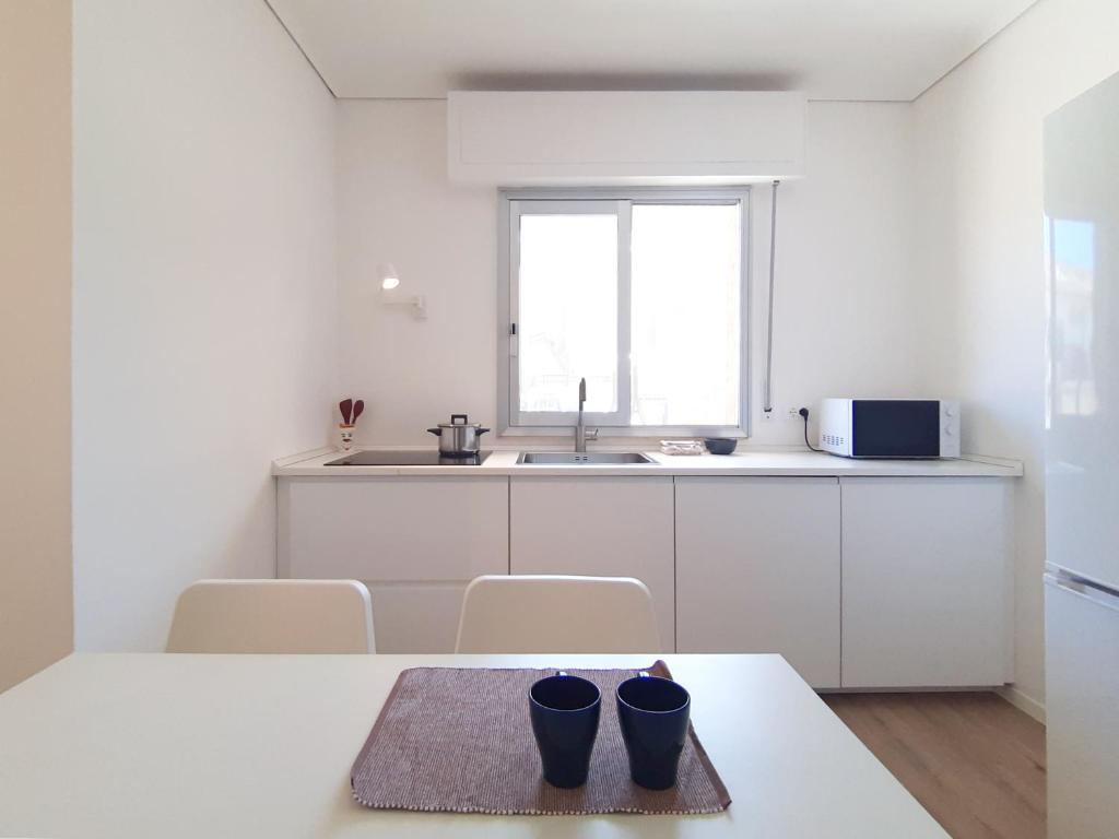 Kuchyňa alebo kuchynka v ubytovaní PAPPA casa vacanze