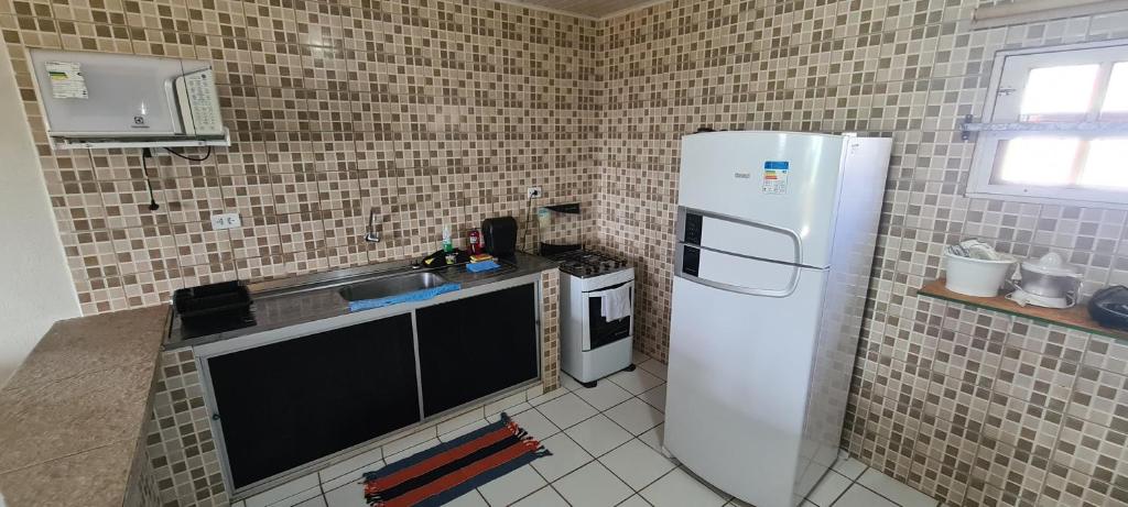  CASA ACONCHEGANTE E ESPAÇOSA
