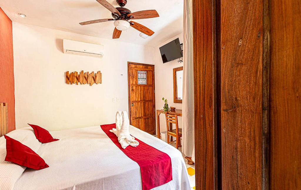 Postel nebo postele na pokoji v ubytování Hotel Boutique Casa Hipil