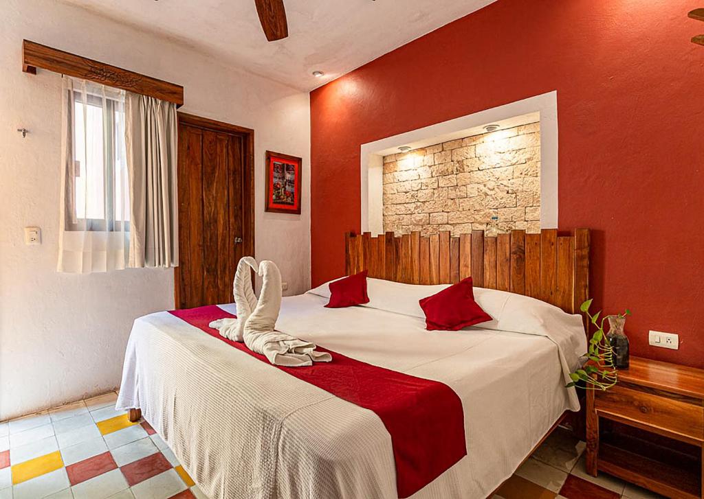Postel nebo postele na pokoji v ubytování Hotel Boutique Casa Hipil