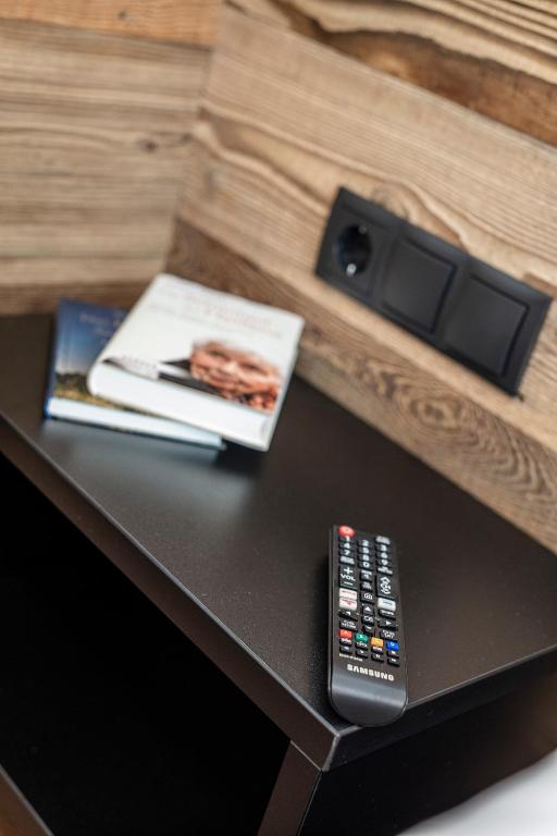 TV a/nebo společenská místnost v ubytování APART GRIES