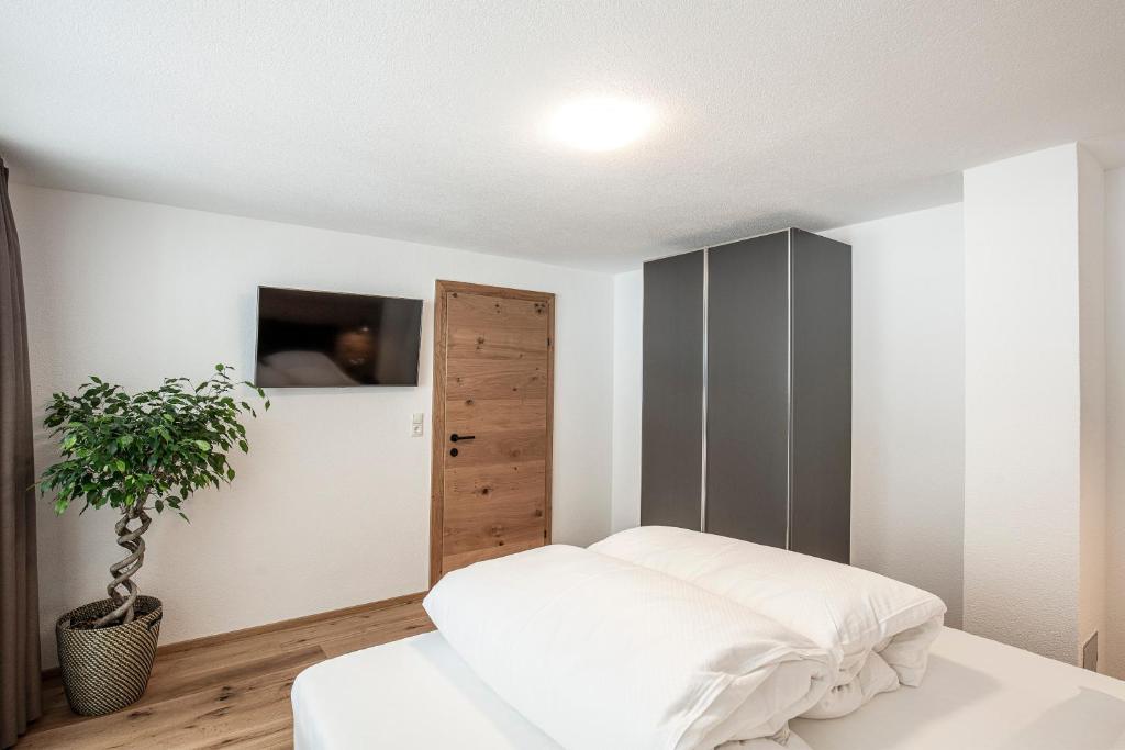 Postel nebo postele na pokoji v ubytování APART GRIES