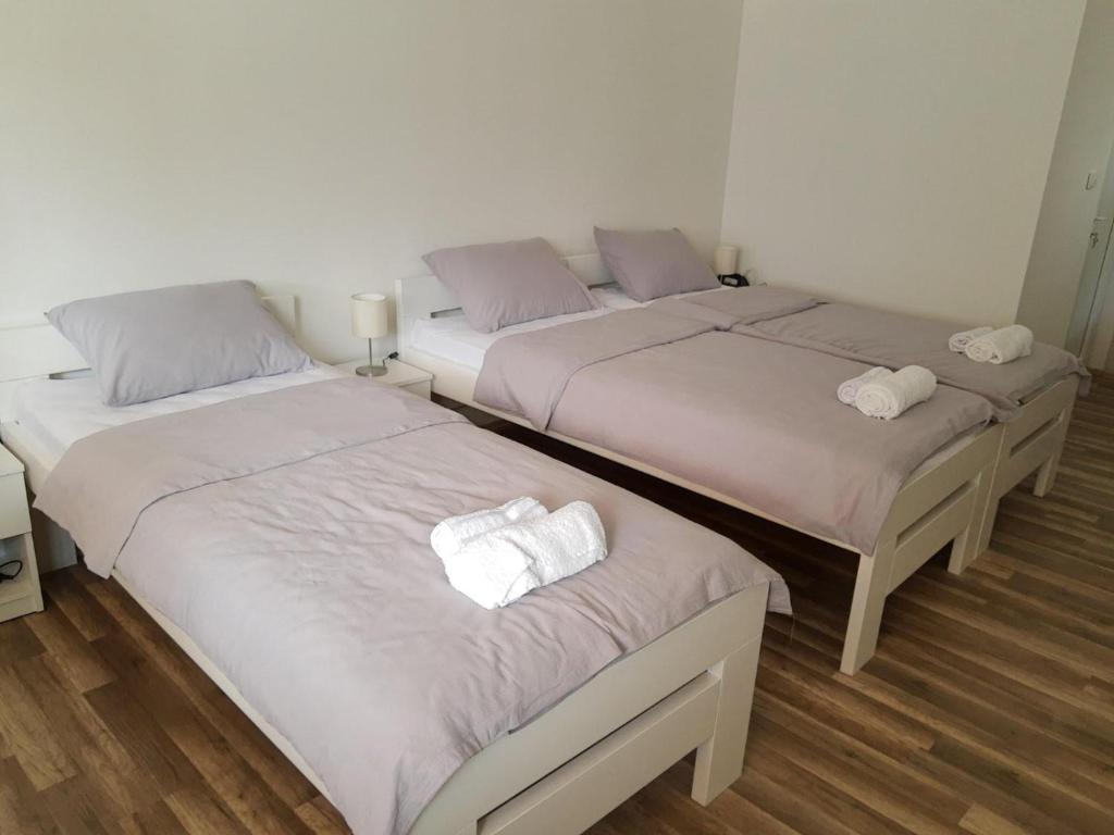Postel nebo postele na pokoji v ubytování Marina