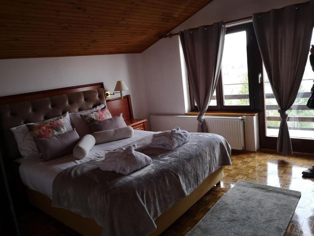 Posteľ alebo postele v izbe v ubytovaní Apartment Gina