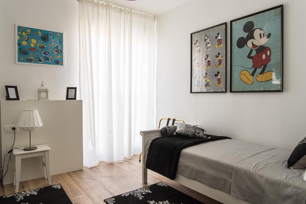 Posteľ alebo postele v izbe v ubytovaní Apartment ARGO