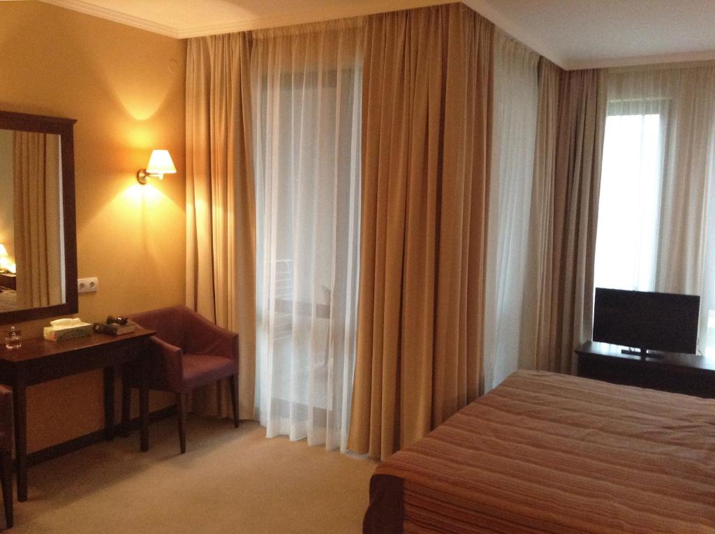 Postel nebo postele na pokoji v ubytování Sunny Beach - Royal Beach Apartment