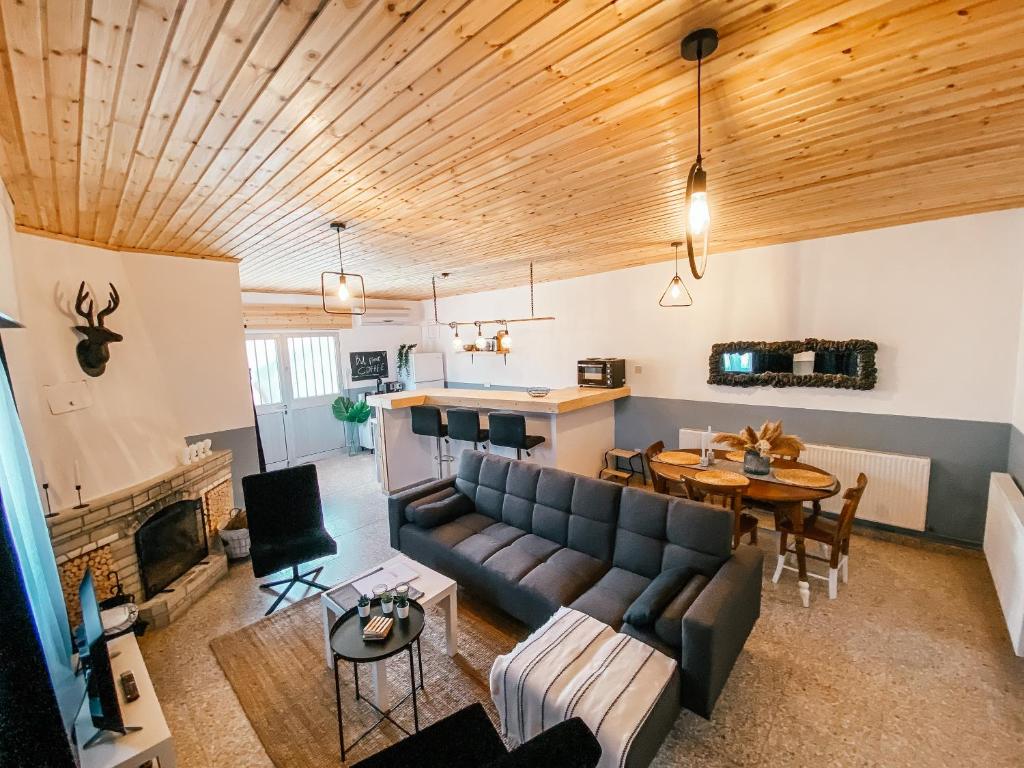 a living room with a couch and a table at Milea Mansion in Limassol